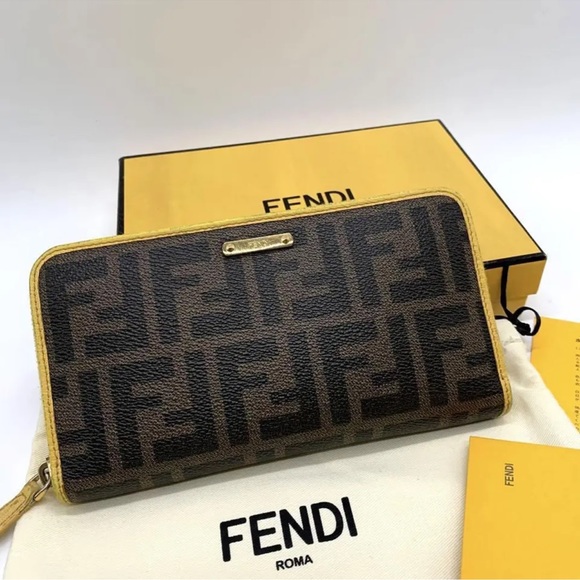 Fendi Handbags - FENDI long wallet Zucca round zip yellow full inclusions authentic